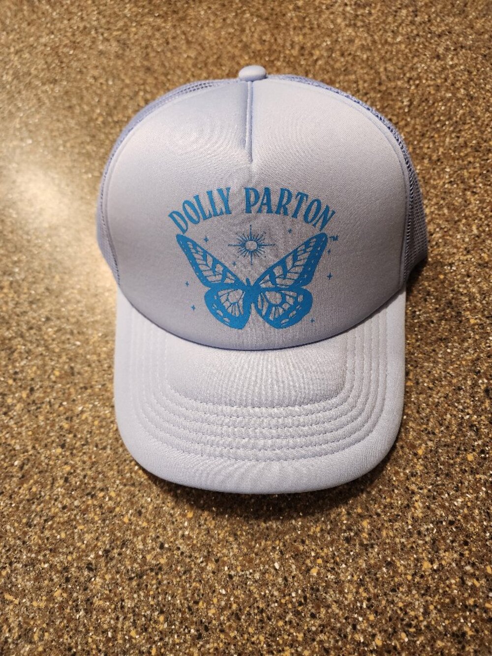 Blue Dolly Parton hat with butterfly